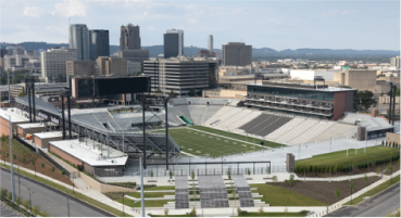Protective Stadium as seen from above with downtown Birmingham skyline visible in background.