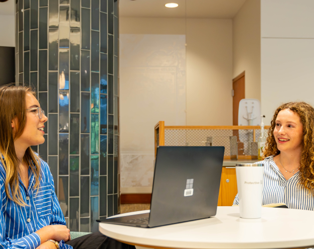 Non-profit employees submitting a grant application to the Protective  Foundation.