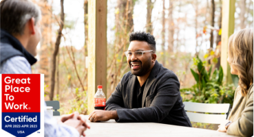 A group of three Protective teammates enjoying a conversation outdoors.