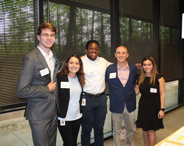 Protective interns standing side by side