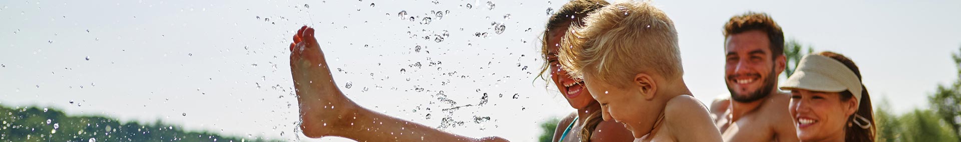 Family playing at the beach