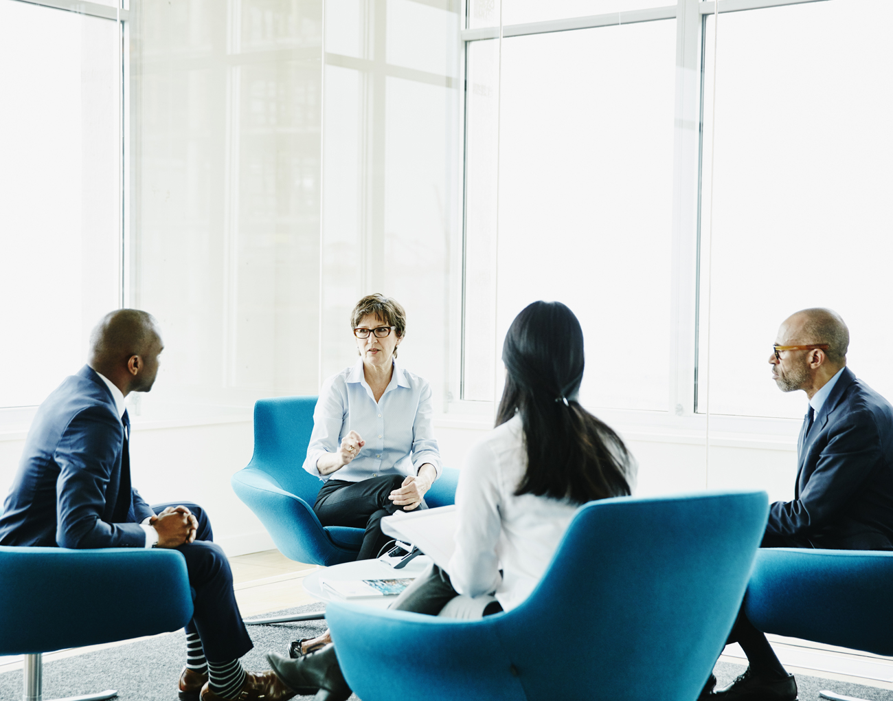 A group meets in an office.