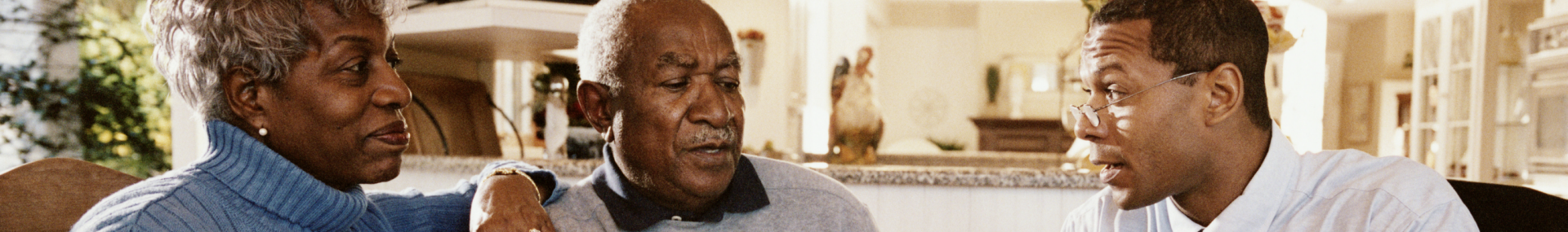 Couple discussing finances with advisor