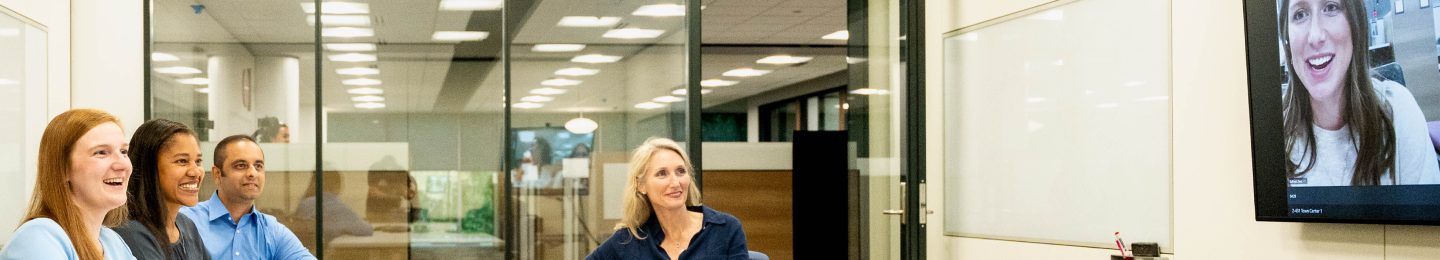 Smiling remote Protective employee working virtually from home.