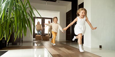 Young family moving into their new home.
