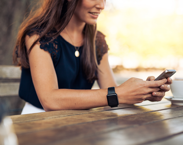 Young woman looking at smartphone.