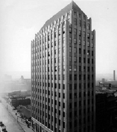 A black and white photograph of the old Protective Life building in downtown Birmingham.