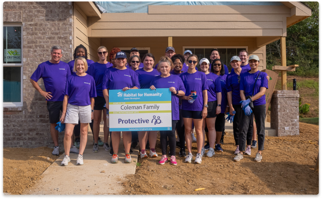 Protective Life employees volunteering in the community with Habitat for Humanity.