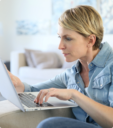 Woman looking at a laptop
